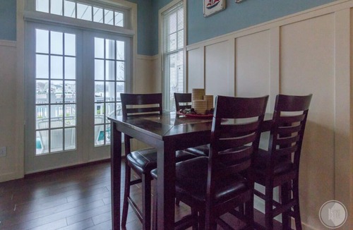 Saugatuck Condo | Discover comfort in Saugatuck at Lake Street Townhome #7, a 3BR retreat with pool views.