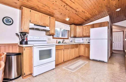 Three Lakes House | Dog-friendly lakefront cottage with private dock, firepit, grill & washer/dryer