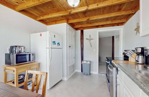 Surf Side Shores Condo | Downstairs duplex near the beach with full kitchen, WiFi, cable, partial AC