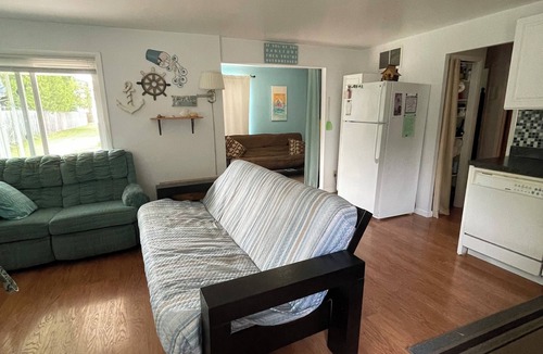 Au Gres House | Enjoy a Lake Huron view less than a minute walk to the beautiful sandy beach.