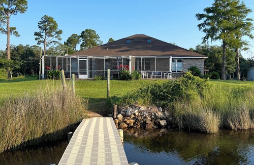 Pensacola House | Enjoy this waterfront home with a pool, dock, and Blue Angels! Bring your boat!