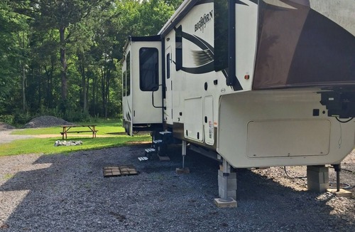 Centre House | Enjoy waterfront camping with the comforts of home.