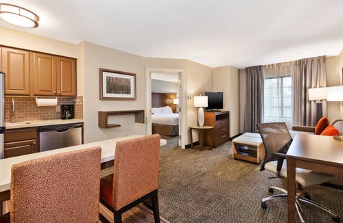 Kalamazoo Condo | Equipped King Suite | Free Daily Breakfast + Indoor Pool
