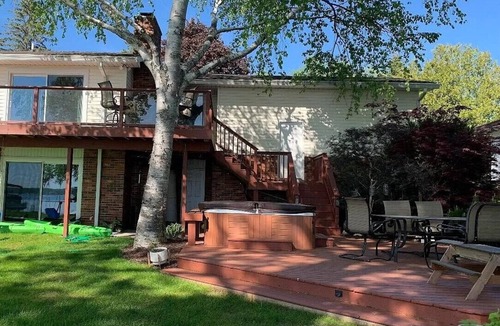 Alpena House | Experience Lakeside Luxury: Your Ultimate Retreat Awaits on Long Lake!