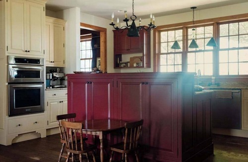 Maple City House | Exquisite Cape Cod home with large yard, fireplace, central AC, & W/D