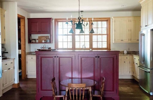 Maple City House | Exquisite Cape Cod home with large yard, fireplace, central AC, & W/D