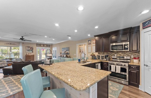 Foley House | Family Home with Swim Spa and Fenced Yard