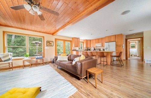 Mayfield House | Firefly Lodge on the Boardman River with Hot Tub and Woodstove