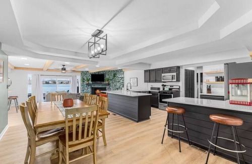 Commerce Township House | Fox Lake Retreat | Dock, Hot Tub, & Gameroom