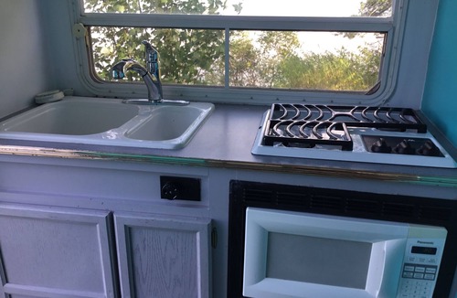Baraga House | Get lulled to sleep by Lake Superior in Vintage camper 5 steps from the water