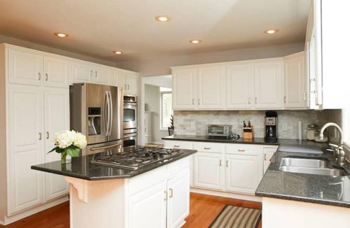 Stevensville House | Guest favorite! Quiet, wooded setting w/heated pool, hot tub, fire pit & more!