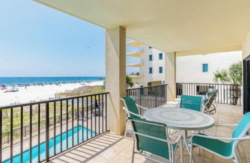 Orange Beach House | Gulf-front condo with spacious balcony resort amenities and cheerful interior