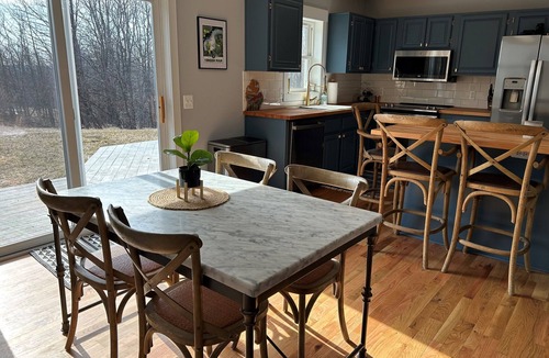 Suttons Bay House | Home north of Suttons Bay. Game room, arcade games, Grill, Fire pit. Dog ok
