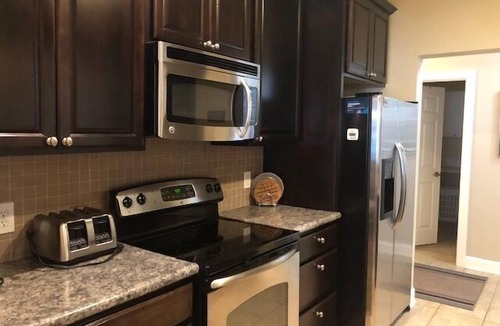 Ludington Condo | It's a Pool View Paradise!