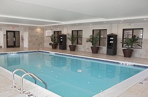 Auburn Hills Apartment | King Suite. Indoor Pool. Free Breakfast. | Near Sea Life Michigan