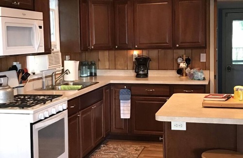 Irons Cottage | Lake Front Cozy Cottage on BBL: Swim, Fish, Fun, Sun , and best of all Relax.