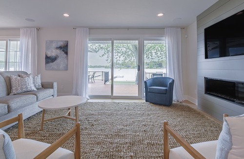 Lowell House | Lake Front Home with open floor plan and amazing back yard accommodates 2 night+