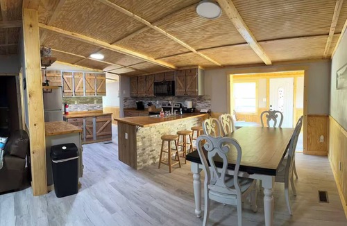Big Creek House | Lake Front Property with a gentle path to a private dock and the lake. 3bd 2 ba