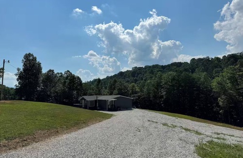 Big Creek House | Lake Front Property with a gentle path to a private dock and the lake. 3bd 2 ba