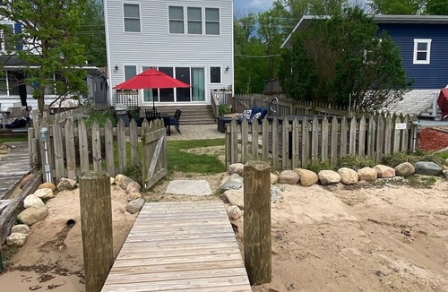 Paw Paw Lake House | Lake Life Awaits with Boat Pier, Beach, Hot Tub, Parking on Paw Paw Lake