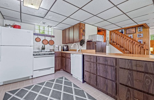 Johannesburg House | Lakefront home with large yard, dock, gas grill, WIFI near golf & ATV trails!