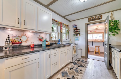 Cheboygan Cottage | Lakefront Michigan Abode w/Deck & Fire Pit!