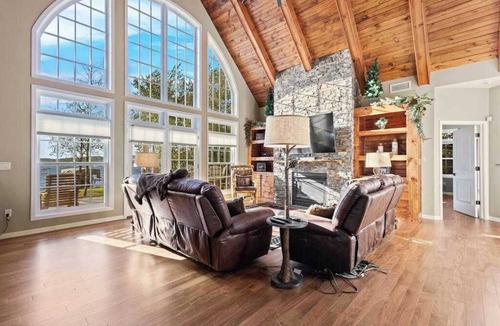 Phelps House | Lakefront retreat with hot tub, water view, game room, home theater & dock