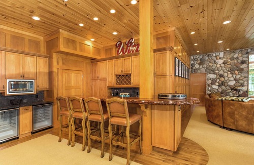 Kewadin House | Lakefront Torch Lake Lodge - 4 Floors of Luxury, 8 Bedrooms, Private Dock