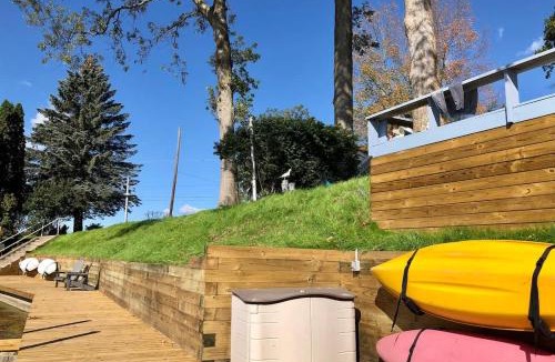 Newaygo House | Lakeside Getaway with Dock, Firepit, Grill