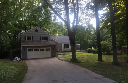 Macatawa House | Large family home with private POOL and hot tub on heavily wooded lot