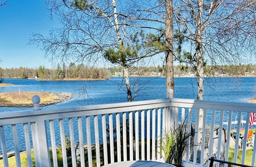 West Branch Cottage | Loon Lookout has its own beach and is on a private lake in West Branch, MI