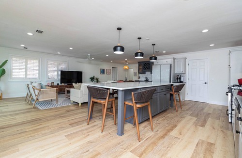 Ono Island House | Luxurious 4-BR Beachfront Escape: Private Beach, Fishing Dock, Boat & Family Fun