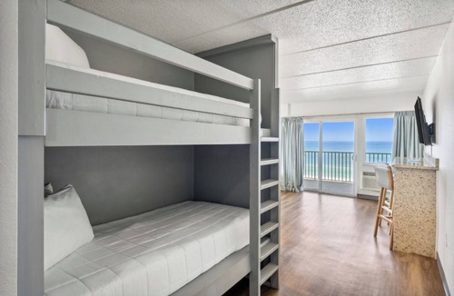 Fort Bay Hotel | Luxurious Beachfront Suite with Queen Beds, Kitchen, and Split Accommodations