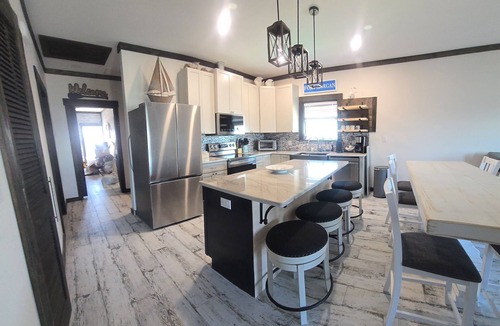 Fort Morgan Pines House | Luxury Home Mobile Bay Waterfront Private Pool 150-Foot Fishing Pier 4Bed 3Bath