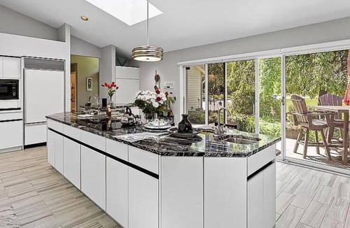 Norton Shores House | Luxury Lakefront 6-Bed Home in Norton Shores with Pool, Hot Tub, Video Games