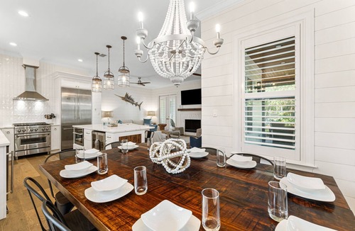White's Gulfview House | Luxury retreat with screened pool, outdoor kitchen & dining, and coastal charm