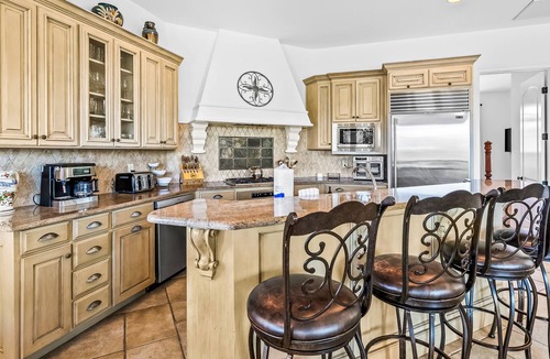 St. Tropez House | Mediterranean-style home with pool & hot tub access, W/D, AC & golf cart