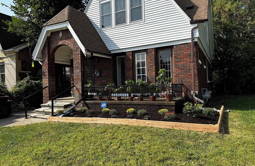 Detroit House | Mid-Century Tudor in Quiet Detroit Neighborhood