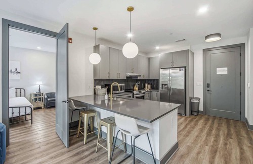 Rolling Mill Hill Condo | Muse Ideally-located condo with city view, central AC, balcony & gym