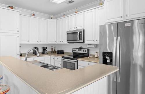 Crystal Shores House | Near Beach and Pool, Beautiful Neighborhood, Dogs Welcome