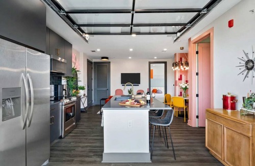Rolling Mill Hill Apartment | Neon rooftop penthouse near Broadway, sleeps 10, downtown Nashville