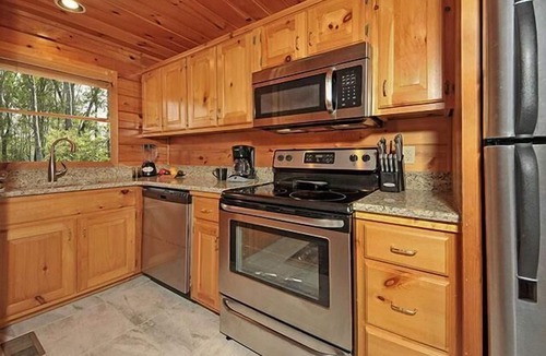 Sevierville Cabin | Nestled Inn: Breathtaking Mountain View - Brand New Hot Tub - Luxury Cabin