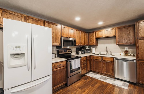 Trowbridge Park House | NEW! Indoor Hot-Tub! Spacious & Updated MQT Township Home!