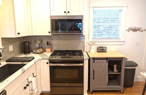 Frankfort House | NEW! The Frankfort Beach Retreat- Gorgeous, Dog-Friendly, and Great Location! Includes Hot Tub and Advanced Central Air Conditioning System! 5 Kayaks and a Paddleboard Included! Perfect Family Getaway!
