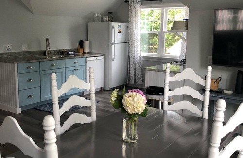 Leland Cottage | North Lake Leelanau carriage/cottage. Sandy beach front on North Lake Leelanau.