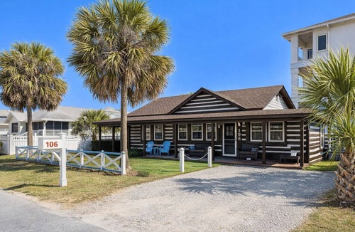 Laguna Beach House | PCB's Historic Log Cabin! 1 min walk to the beach. Sleeps 8 - Dog-Friendly.