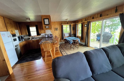 Traverse City House | Peaceful Traverse City Lake Front w/Fireplace, Sauna, & Kayaks, Pontoon Avail.