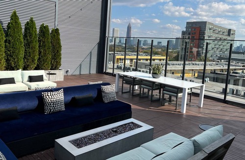 Home Park Apartment | Penthouse Midtown Views in Eccentric Green Jungle