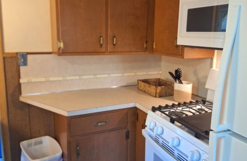 Frederic House | Perfect 4-bedroom house in Frederic for your next getaway. Plenty of parking!