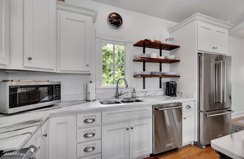 Crane Hill House | Prime location on Lewis Smith Lake. Clean, modern cottage vibes, but sleeps 9!
